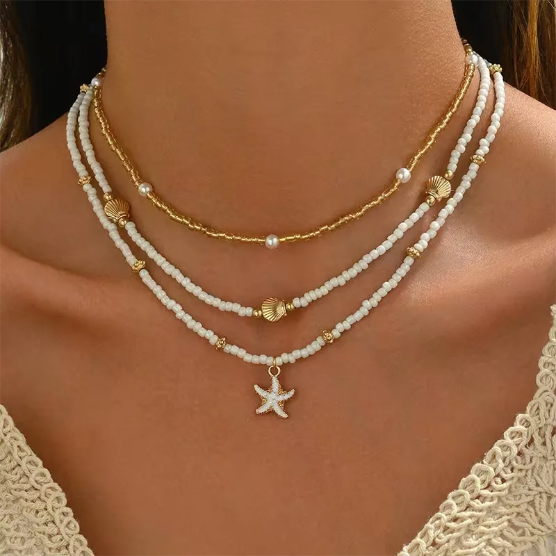 Ketting met schelp en ster - Image 2