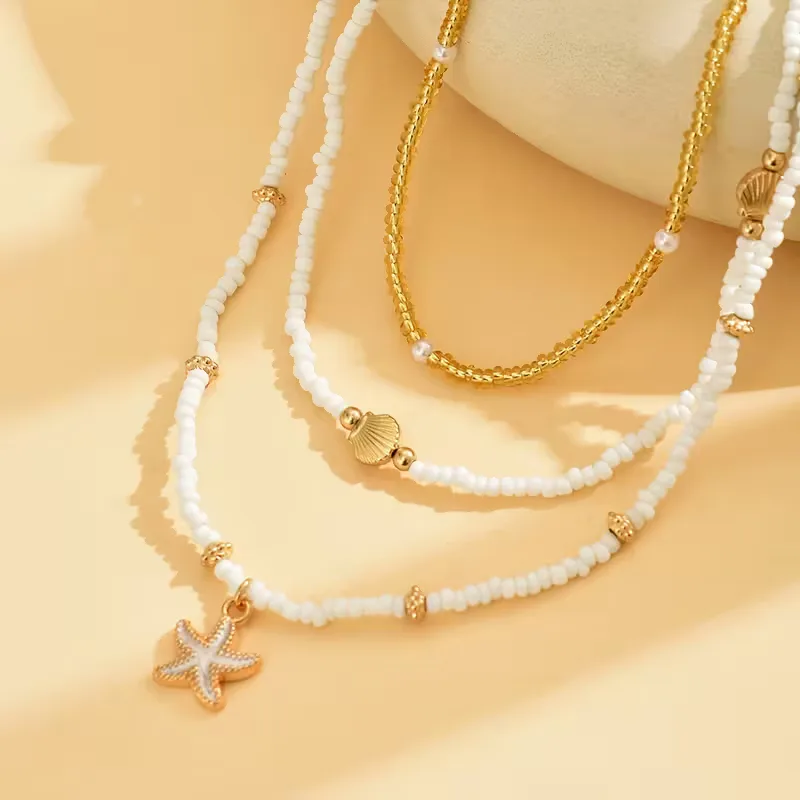 Ketting met schelp en ster - Image 4