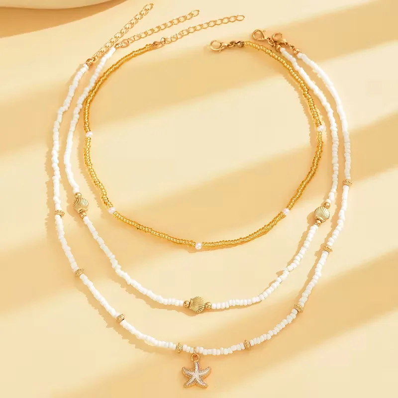 Ketting met schelp en ster - Image 5