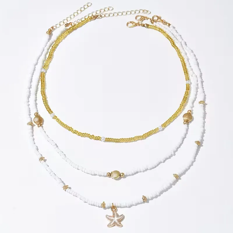 Ketting met schelp en ster - Image 6