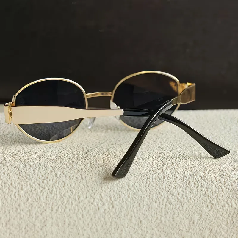 Zonnebril met ovaal metallic frame - Image 9